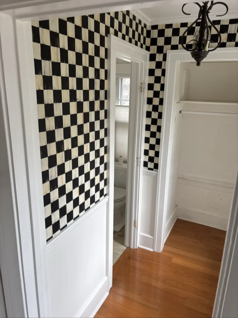 Remodel of small bathroom to add shower and custom cabinet